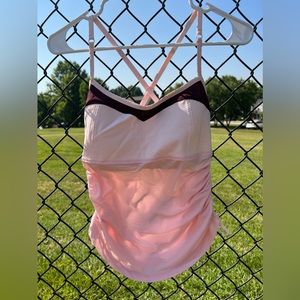Lulu Lemon pink and maroon crisscross back tank top with built in bra size 6.
